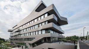 Jürgen Mayer H's FOM Hochschule building features bulging balconies and  seamless stairs